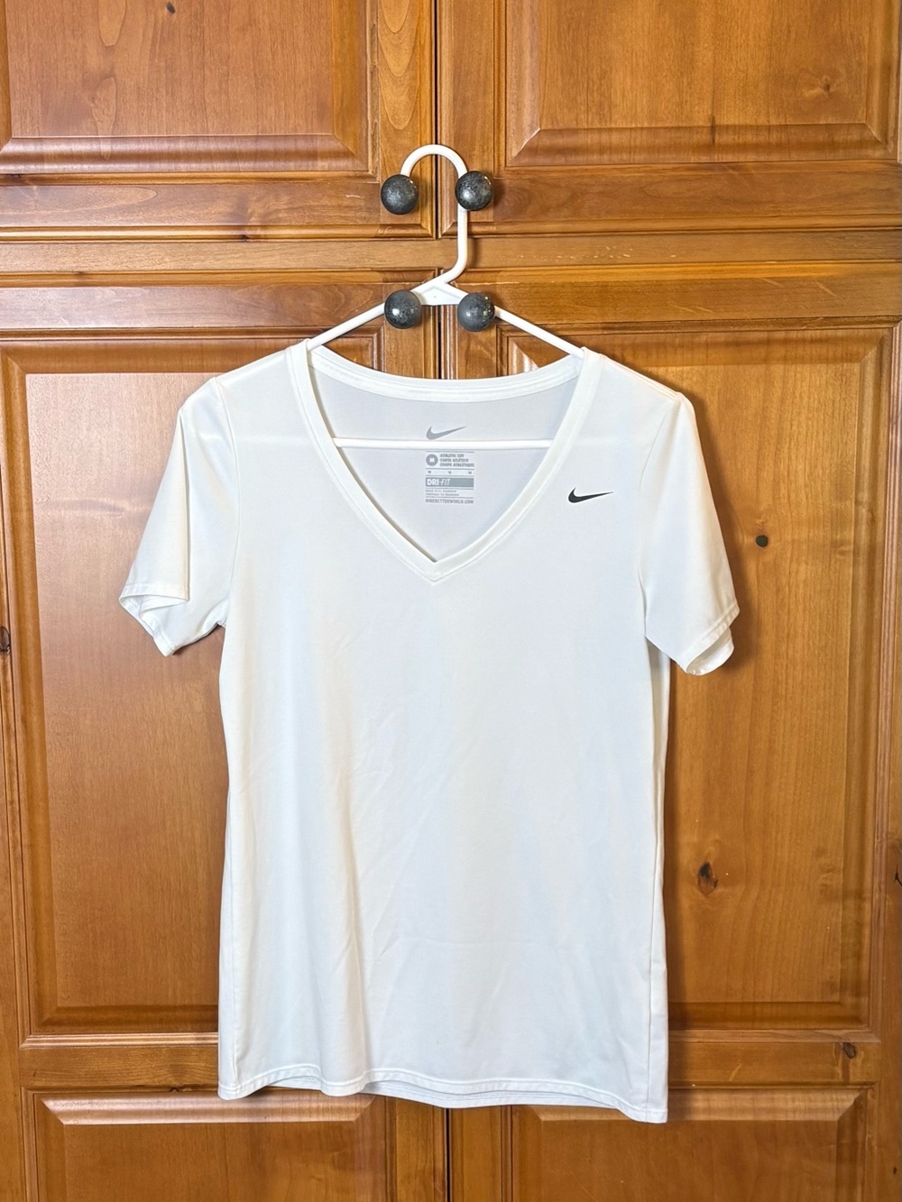 Nike White Short Sleeve V-Neck Tee with Black Swoosh